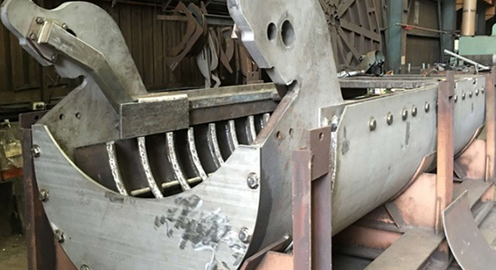 Analysis on Failure Causes and Countermeasures of Blast Furnace Distributing Chute